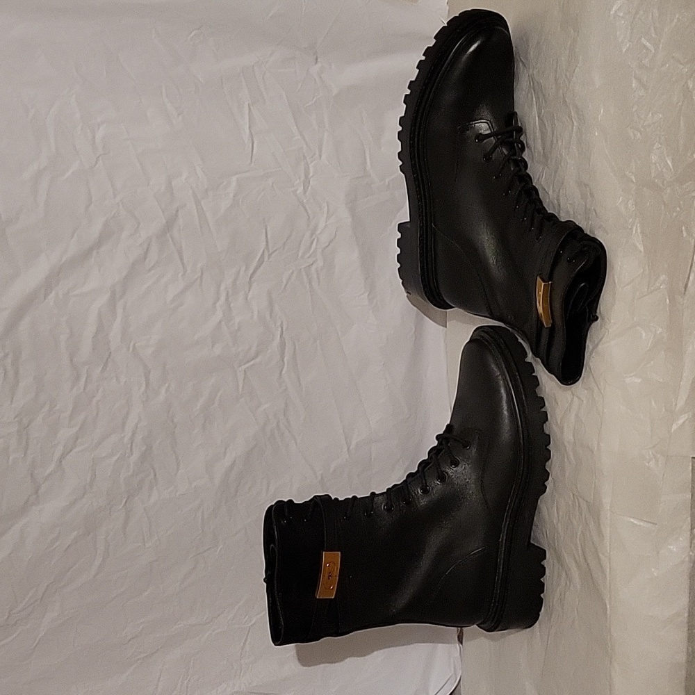 Tory Burch black leather combat boots in size 10